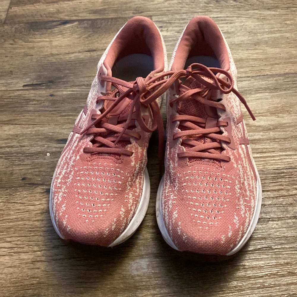 Pink ASICS running shoes